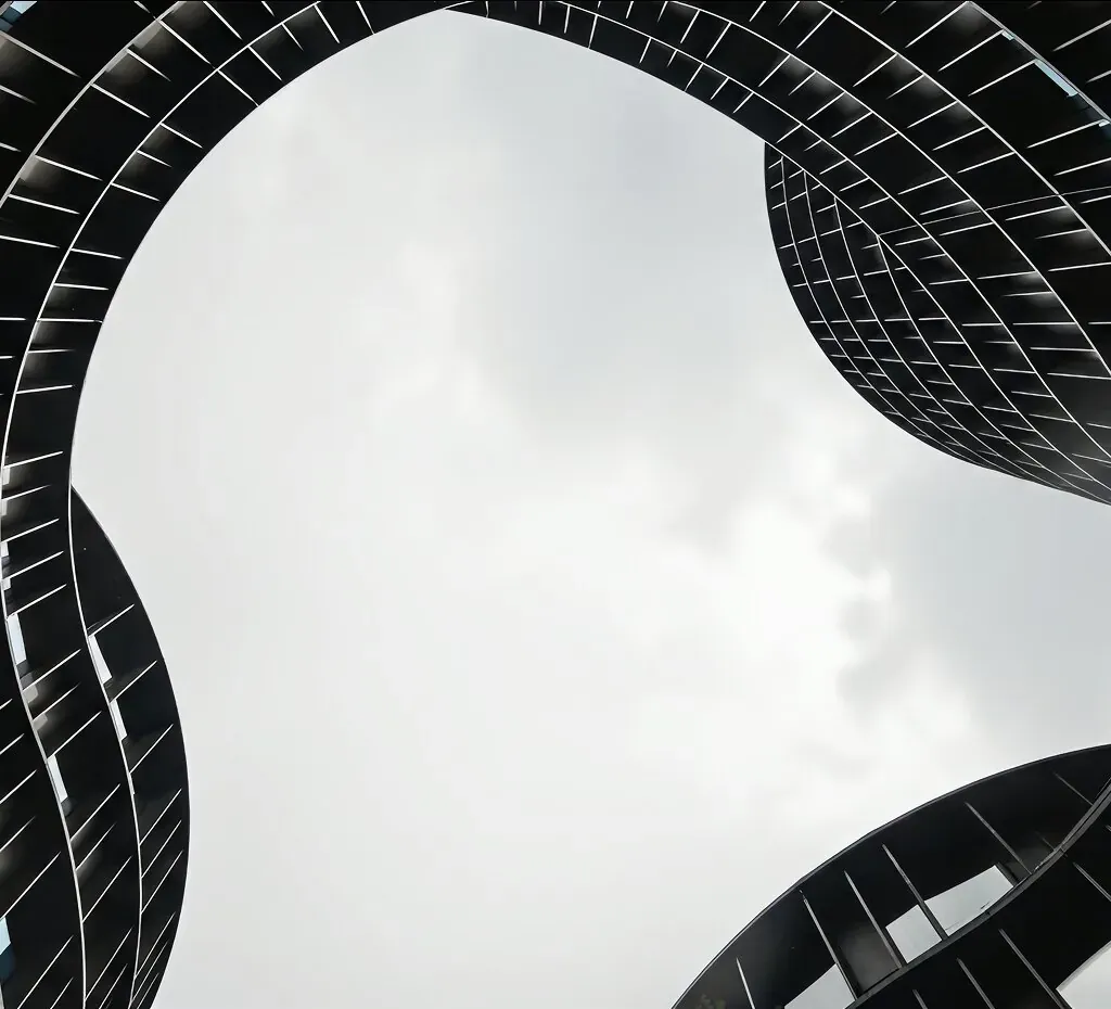 Curved architectural detail reflecting the firm's nuanced approach to complex disputes